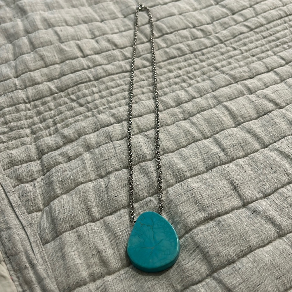 Silver necklace with large turquoise stone
